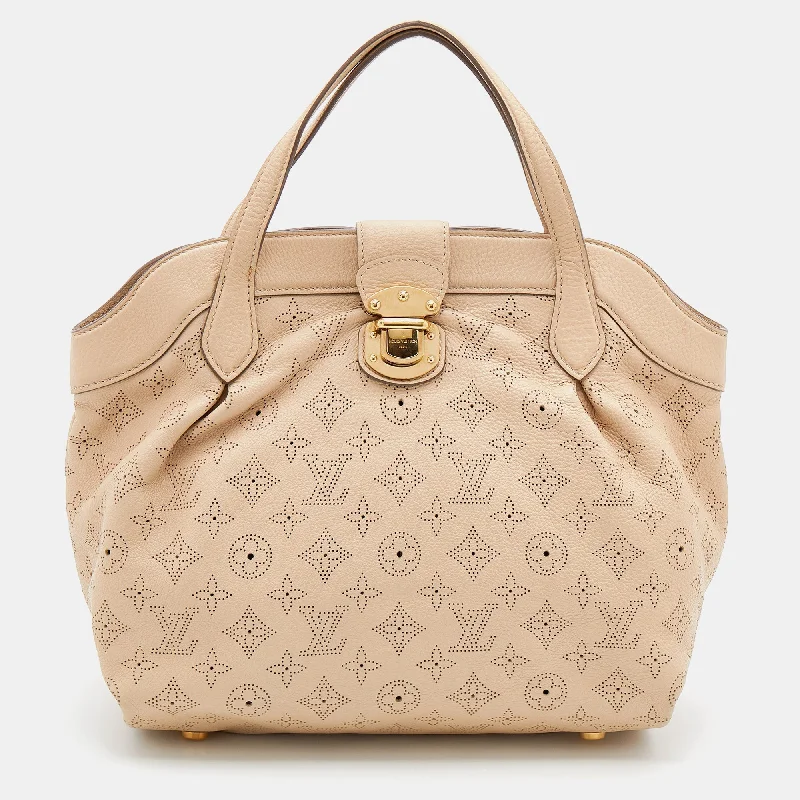 Ladies Louis Vuitton Capucines bags with a detachable shoulder strapLouis Vuitton Coquill Monogram Mahina Leather Cirrus PM Bag