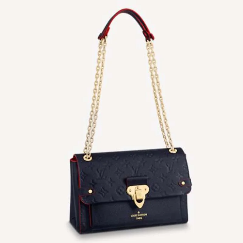 Louis Vuitton Alma bags featuring the signature top - handle designLouis Vuitton Women Vavin PM Handbag Navy Blue Red Embossed Supple Grained Cowhide