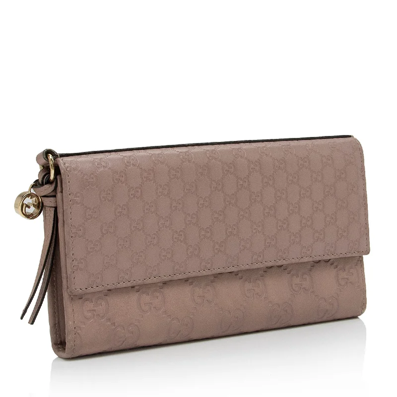 Women Gucci bags with a magnetic snap closure for easy accessGucci Guccissima Leather Bree Continental Wallet (NXJ3NA)