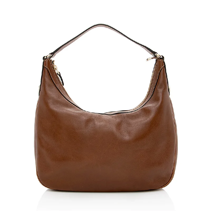 Gucci backpacks for women with a multi - pocket designGucci Leather Charmy Small Hobo - FINAL SALE