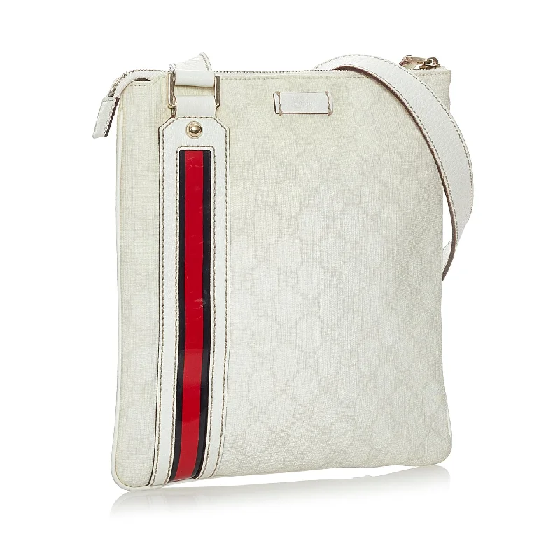 Gucci tote bags for women with a printed Gucci logoGucci Guccissima Crossbody Bag (28112)