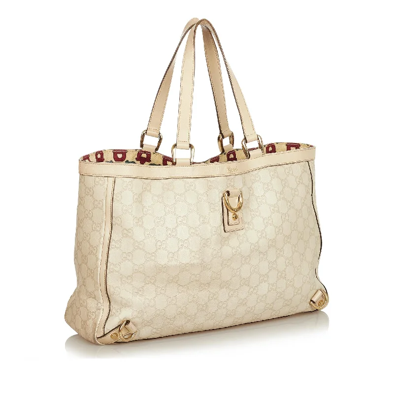 Gucci tote bags for women with a spacious interiorGucci Guccissima Abbey D-Ring Tote Bag (31868)